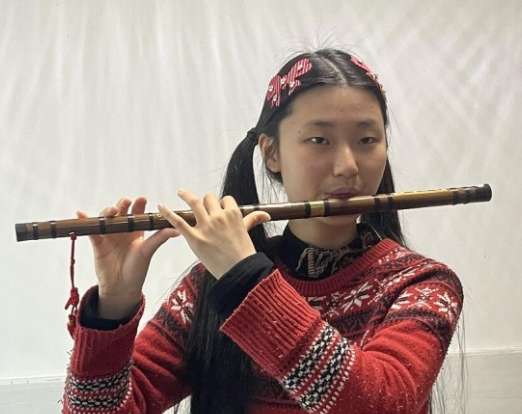 Father trained his intellectually handicapped daughter to become an instrumentalist through self-study
