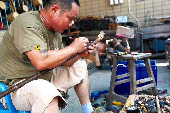 漳浦大广弦制作技艺传承人林旺国二十几年如一日：打磨乐器 弦音不辍