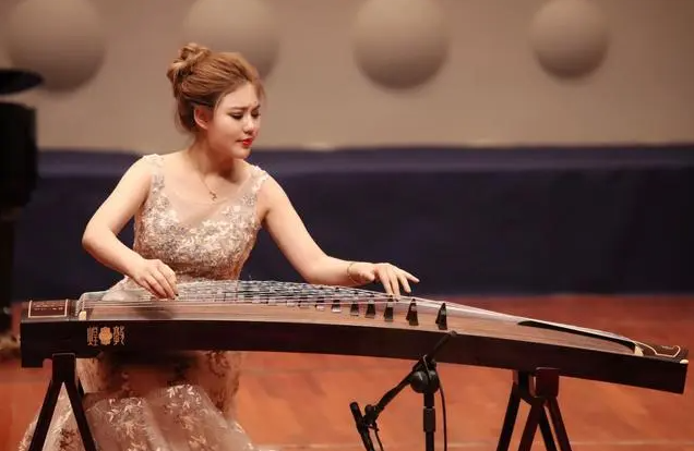 Why do you need to participate in competitions to learn guzheng?