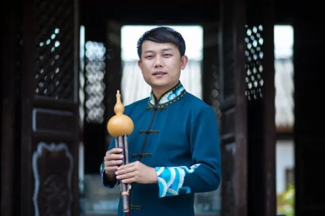 National culture inheritor Ni Kaihong: With cucurbit flute blowing youth striving song