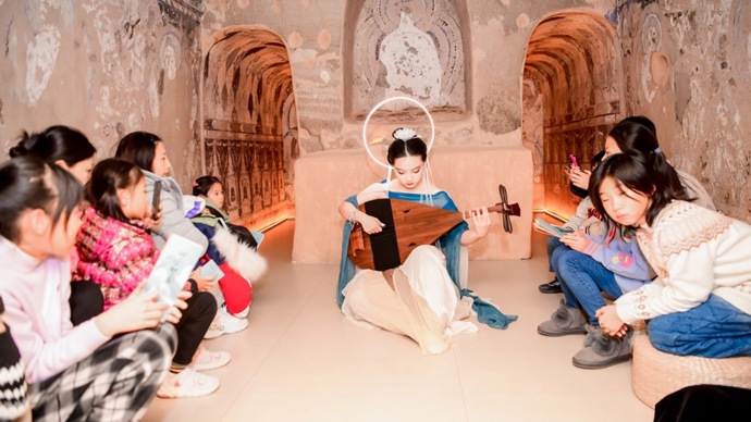 Enjoy Pipa in the recarved grottoes Immersive concert in the first professional museum of journalism and publishing in China